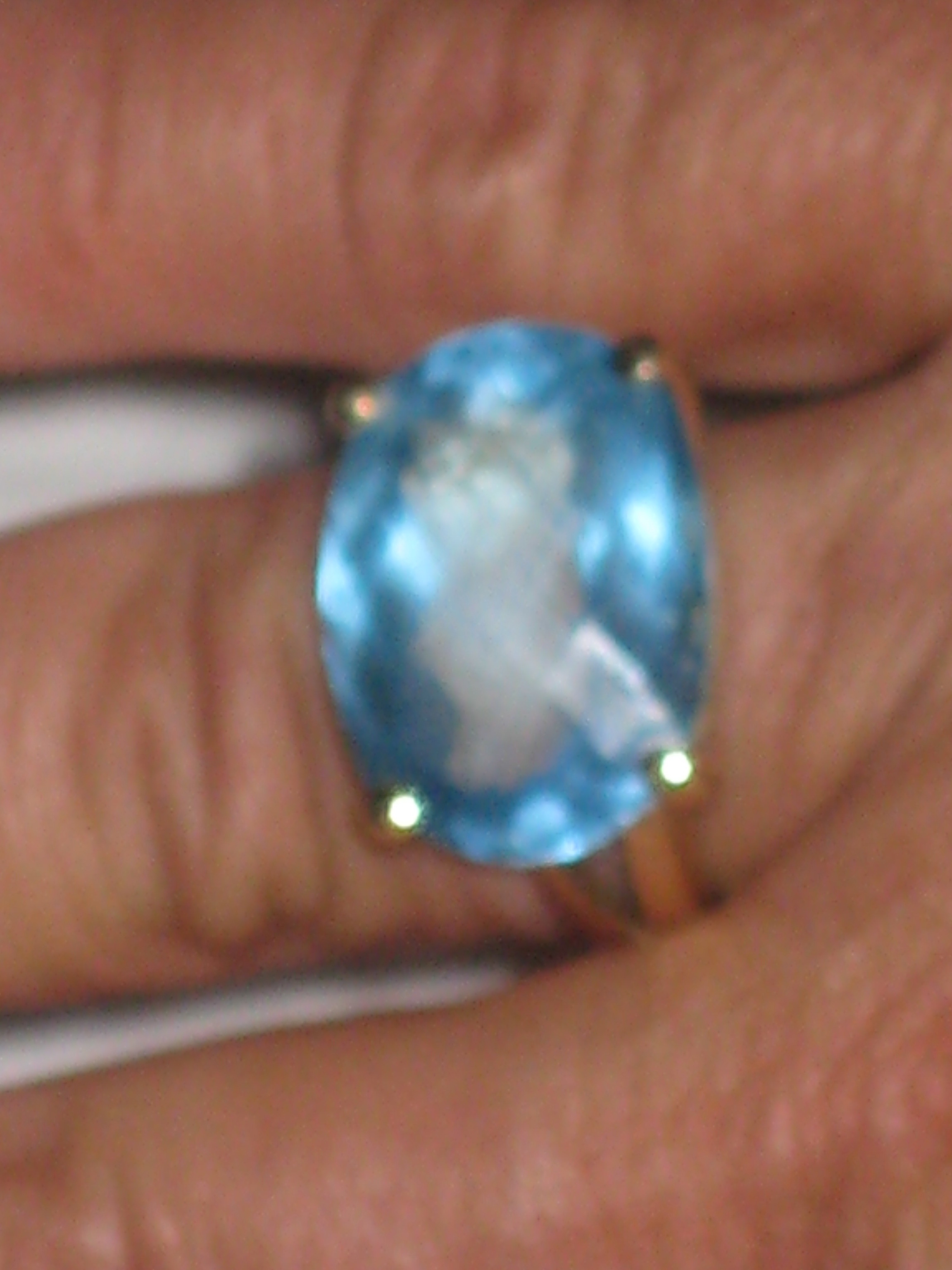 13 carat london blue topaz ring.14 carat gold, size 7.